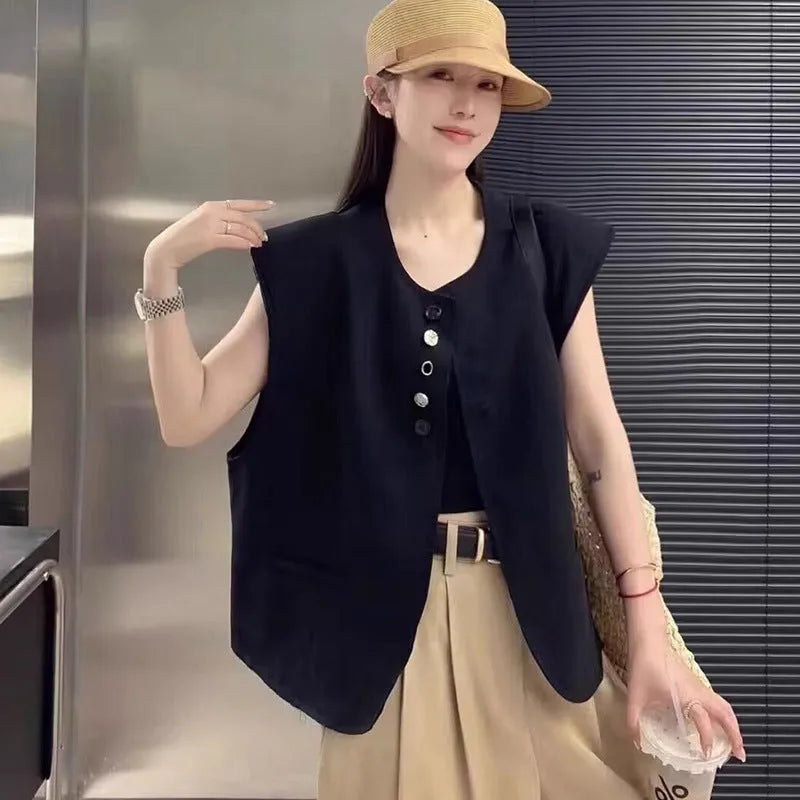 Women's loose-fit polyester vest in milky white with a pocket, shown on a hanger.