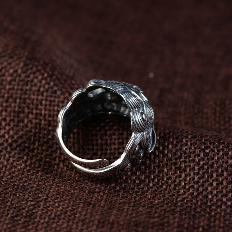 Personalised silver open ring with a detailed jibeast or animal zodiac pattern on a retro-style band.