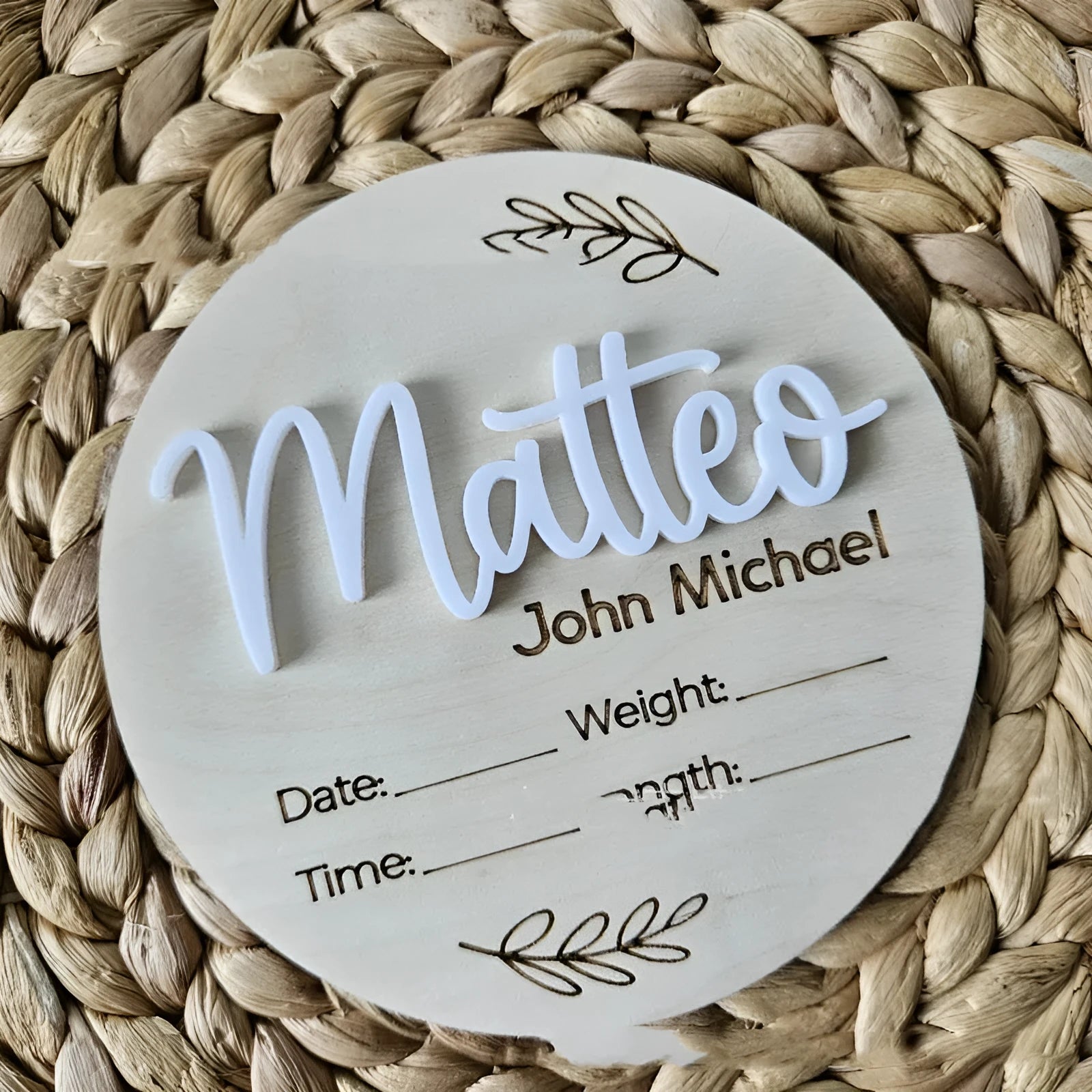 Square wooden baby name plaque showing newborn birth information, 15cm on each side.
