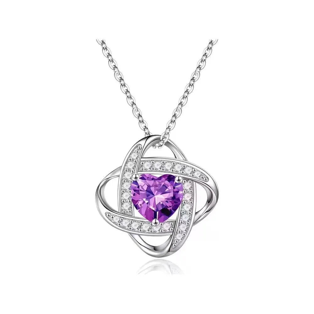 Close-up of a heart-shaped ladies necklace in electroplated copper, showing one of the platinum-toned colour options.