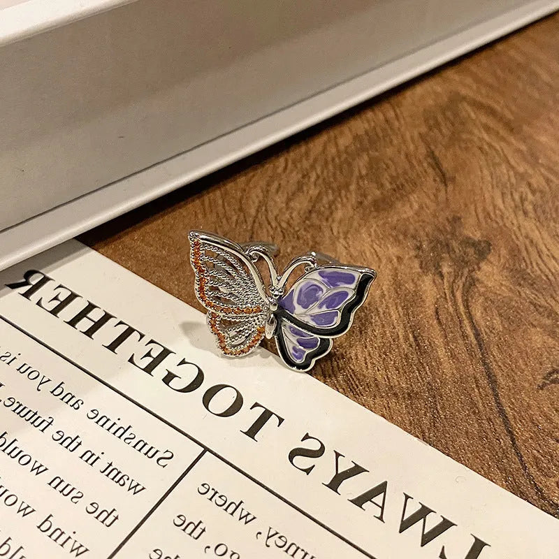 Women's copper butterfly ring with dripping oil finish and adjustable open loop design