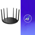 TL-WDR7661 black wireless router with multiple antennas on a desk