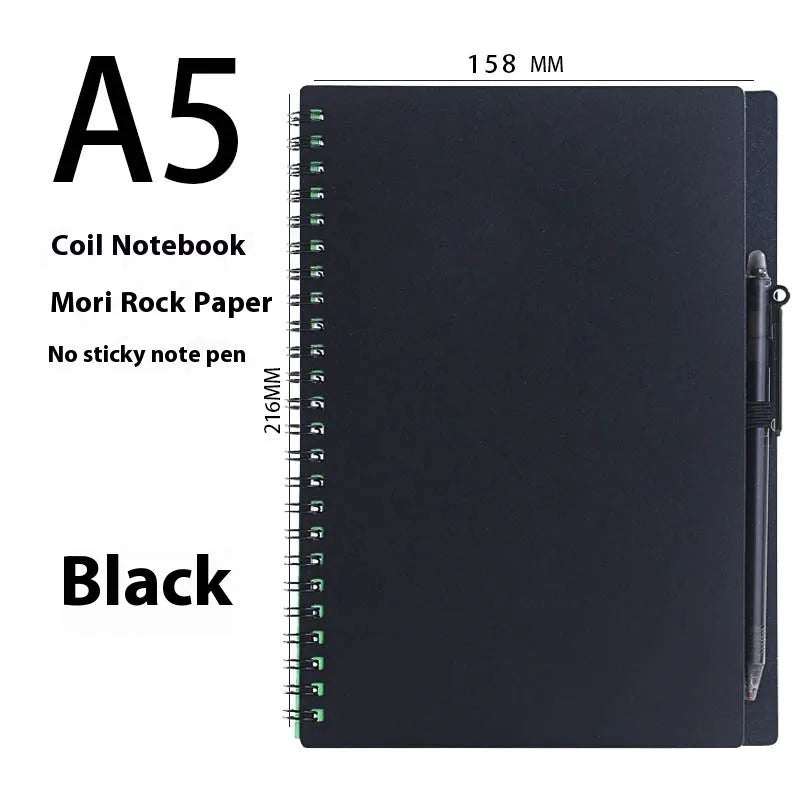 A5 erasable coil notebook with stone paper and pen on wooden surface