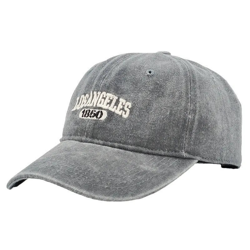 Retro personalised embroidered peaked cap in acrylic fabric with adjustable fit and distressed lettering