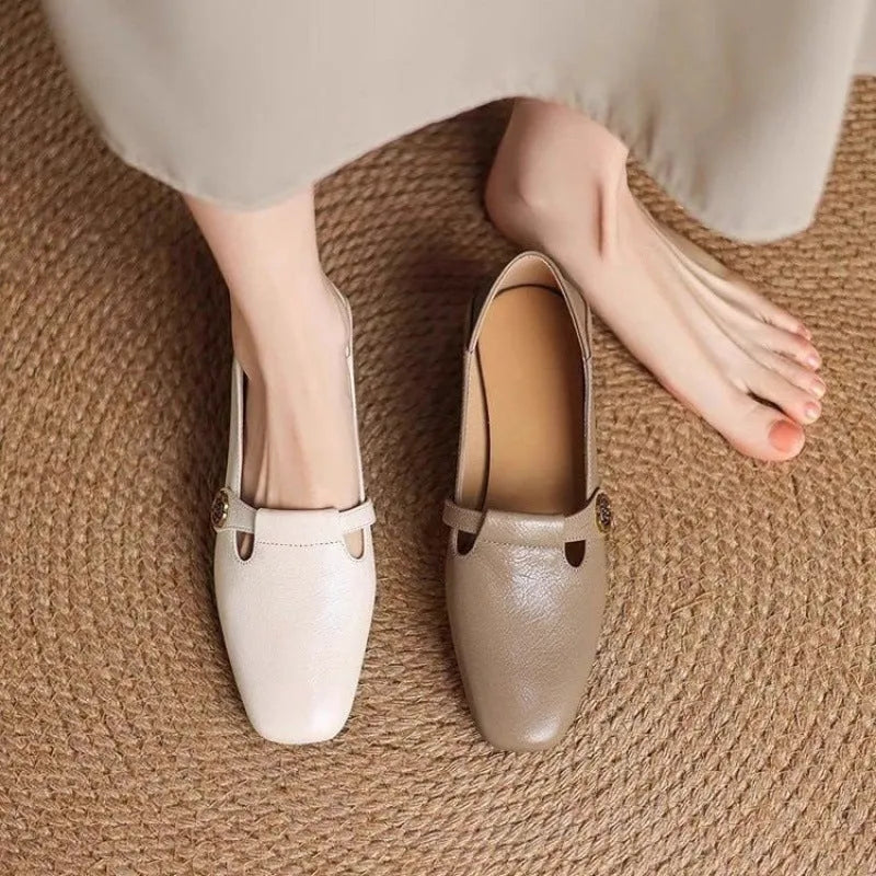 Retro square head genuine leather women shoes in beige with mid heel and square heel on a grey background