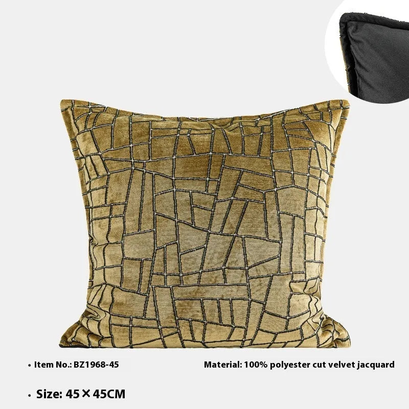 Gold geometric abstract pattern on square and rectangular polyester cushion covers.