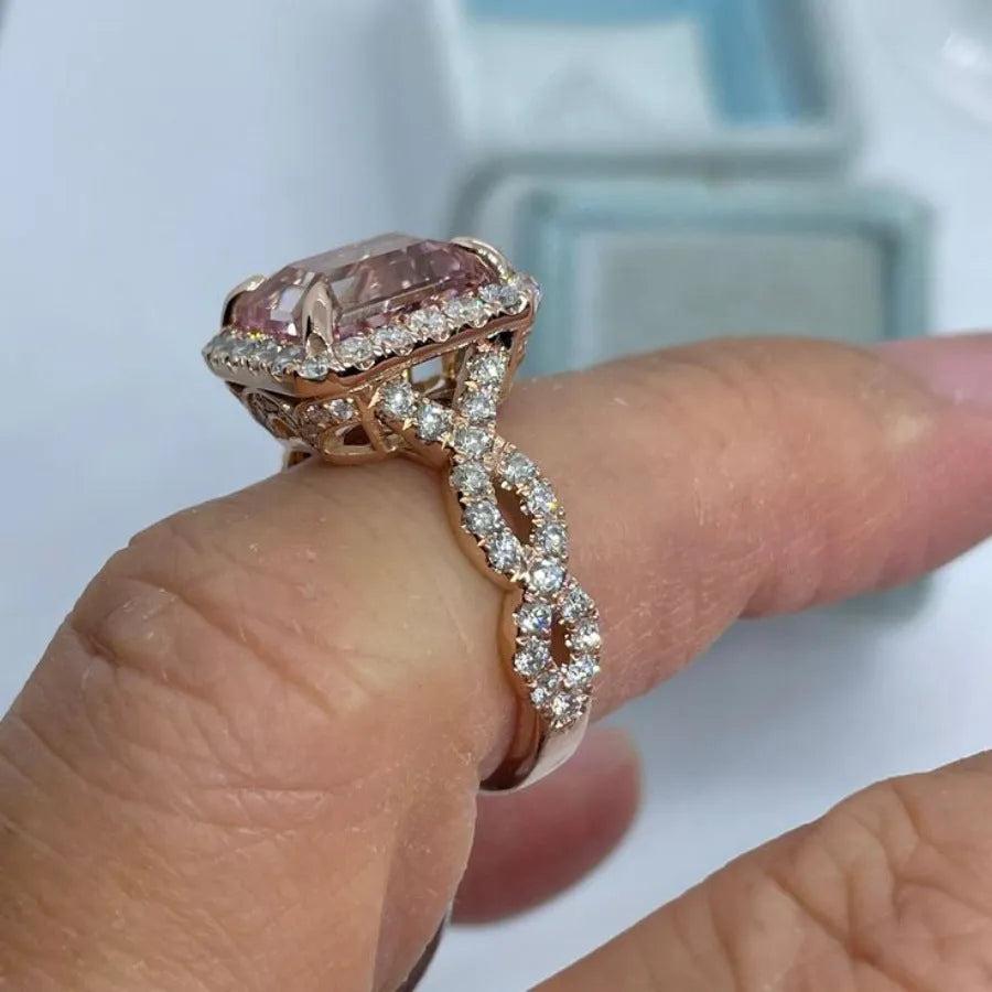 Geometric rose gold alloy ring showing straight edges and angular design
