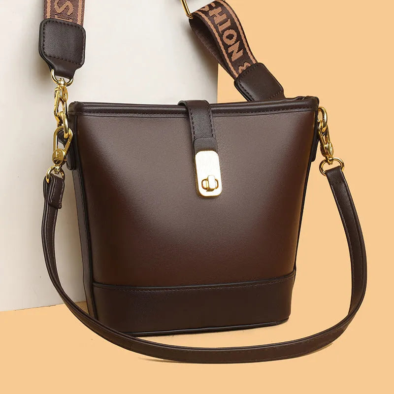 Korean style black bucket messenger bag with double shoulder straps and internal compartments