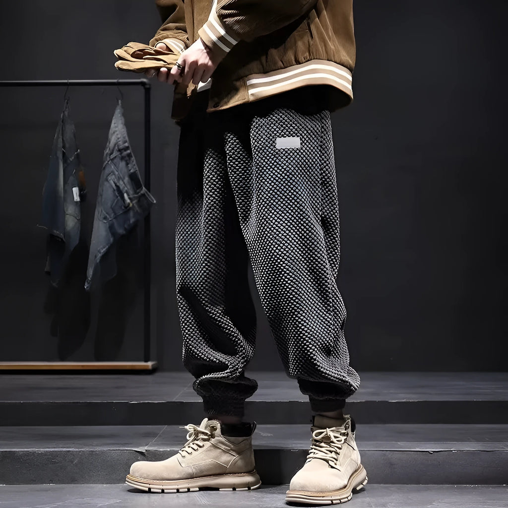 Men's grey ankle-tied sweatpants with straight leg cut and adjustable cuff ties
