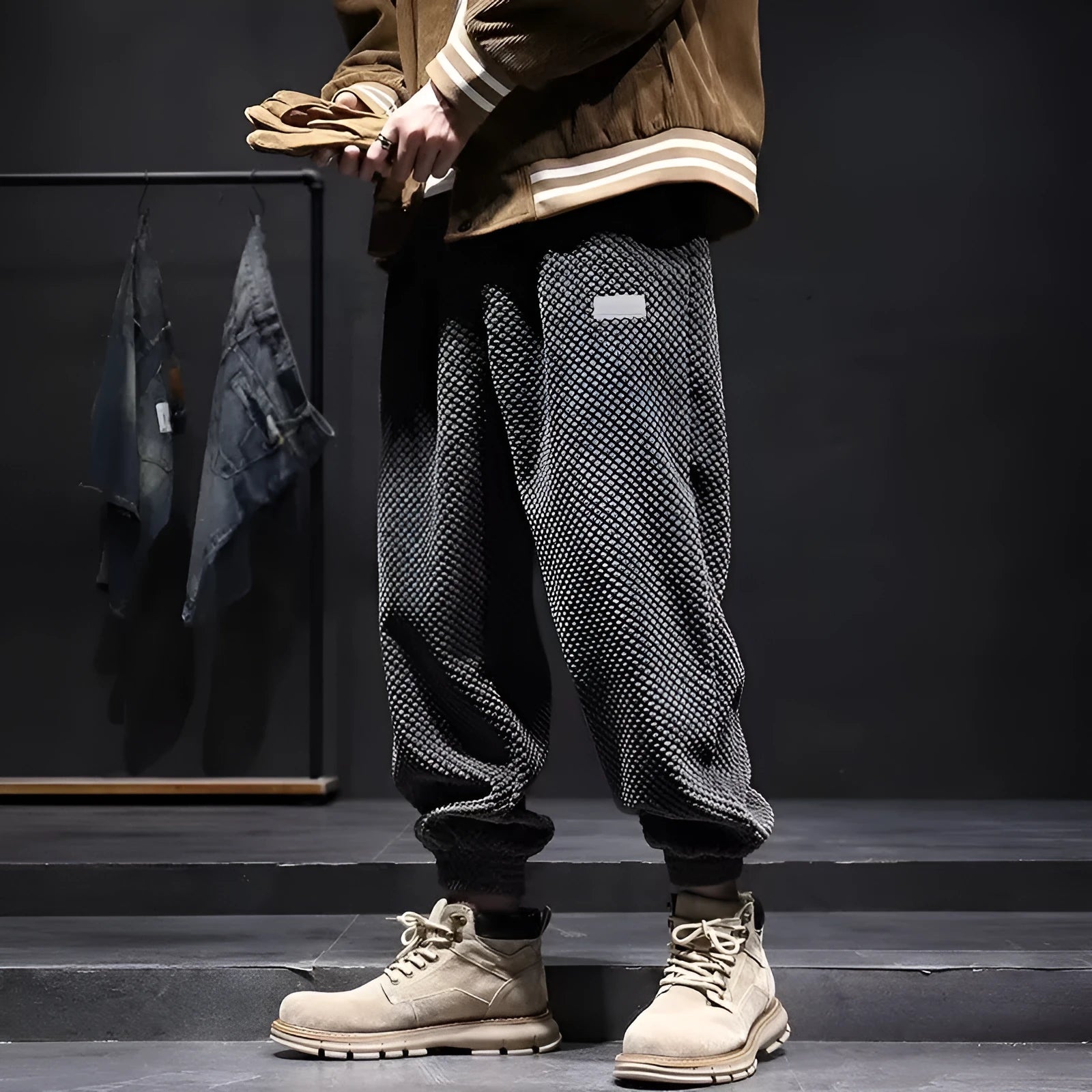 Men's grey ankle-tied sweatpants with straight leg cut and adjustable cuff ties