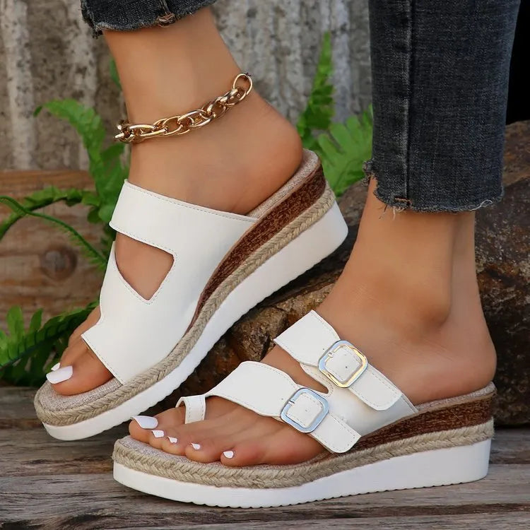White patent leather woven wedge sandals with peep toe and round toe design