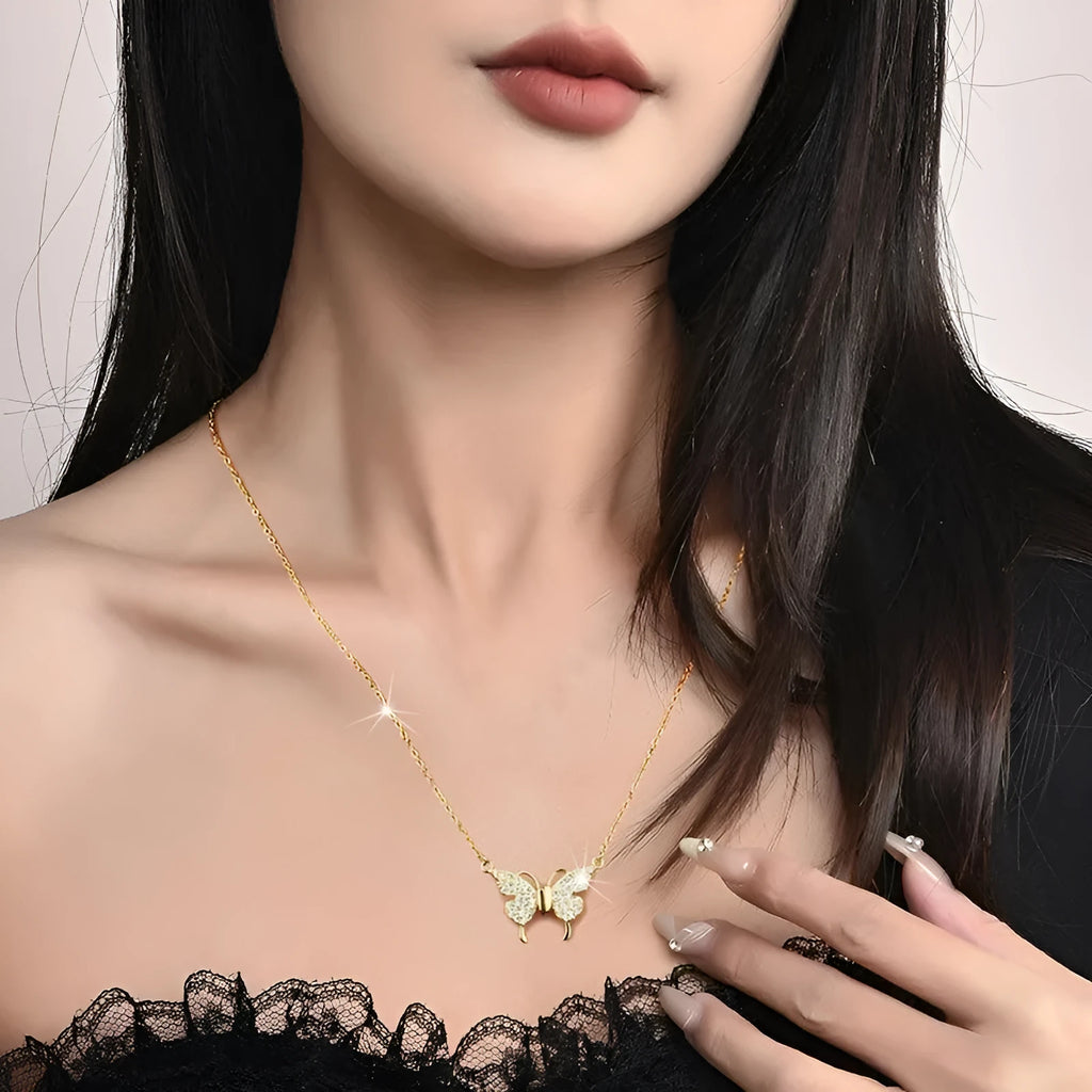 Gold magnetic snap butterfly necklace with twisted titanium steel chain at clavicle length