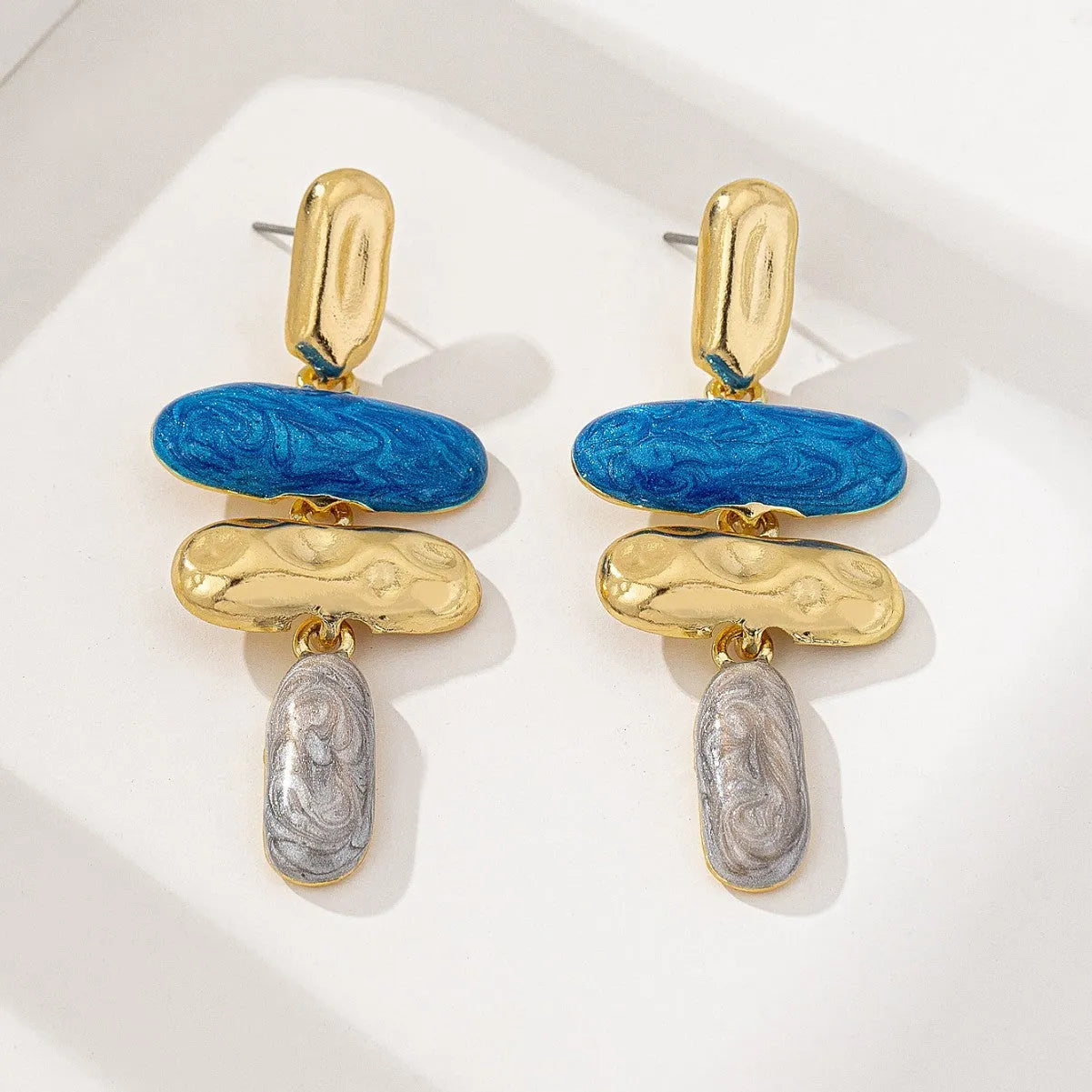Geometric stud earrings with multicolor electroplated finish on zinc alloy