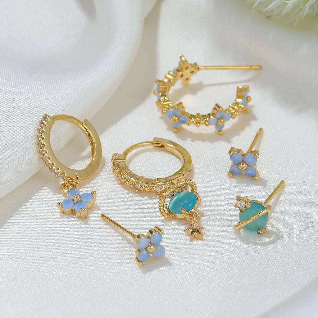 Gold and silver flower stud earrings with zircon mosaic detail in Japanese Korean style
