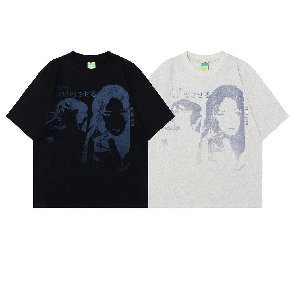 Men's black and grey loose fit cotton t-shirt with a retro character design print on the front.