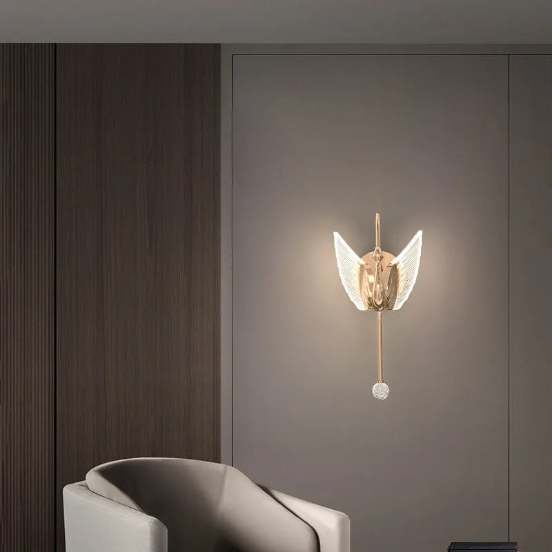 Gold minimalist swan wall lamp with iron construction and acrylic shade for bedside lighting