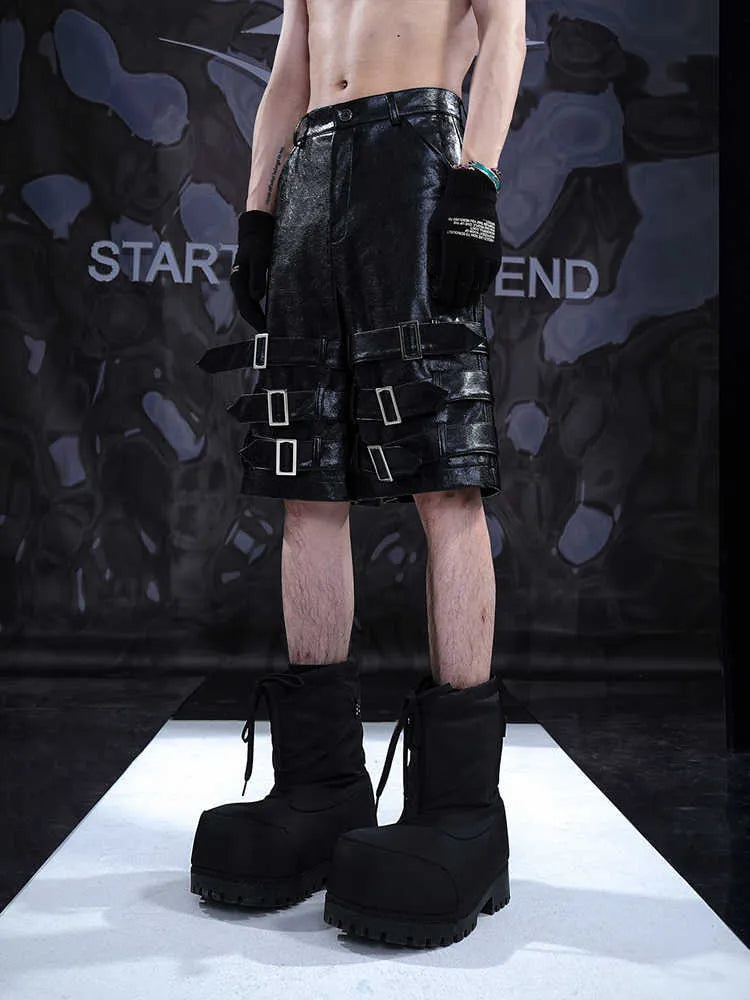 Men's black PU leather ring casual shorts made from stretch spandex fabric.