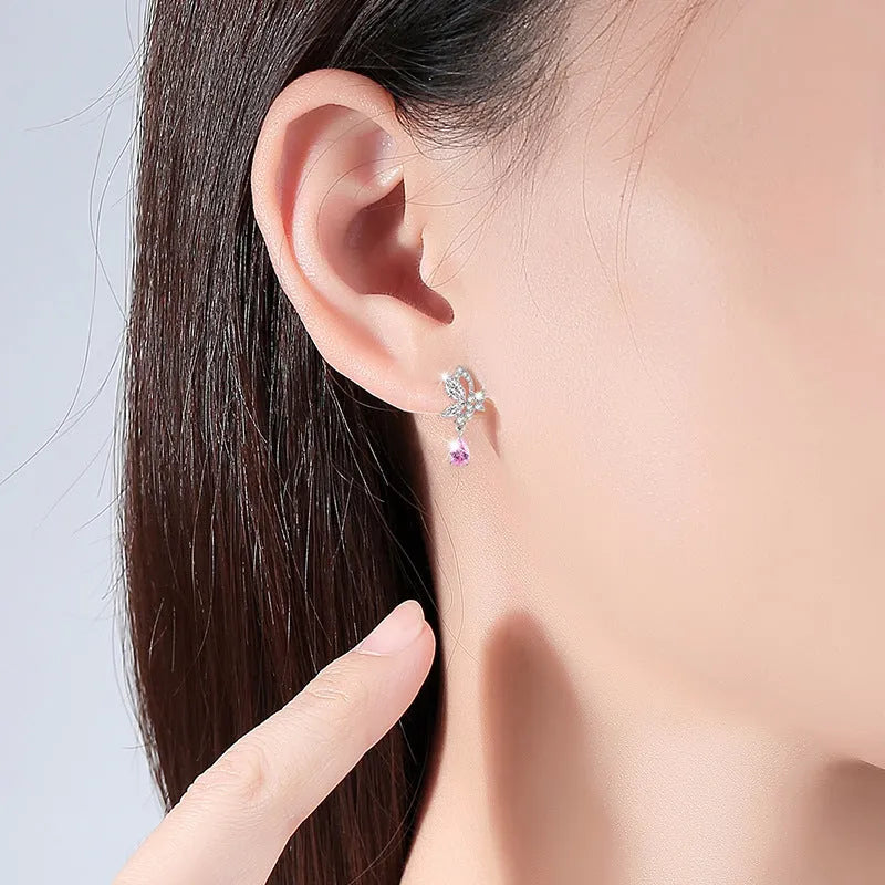 Crystal butterfly stud earrings in 925 silver with clear crystal accents on wings