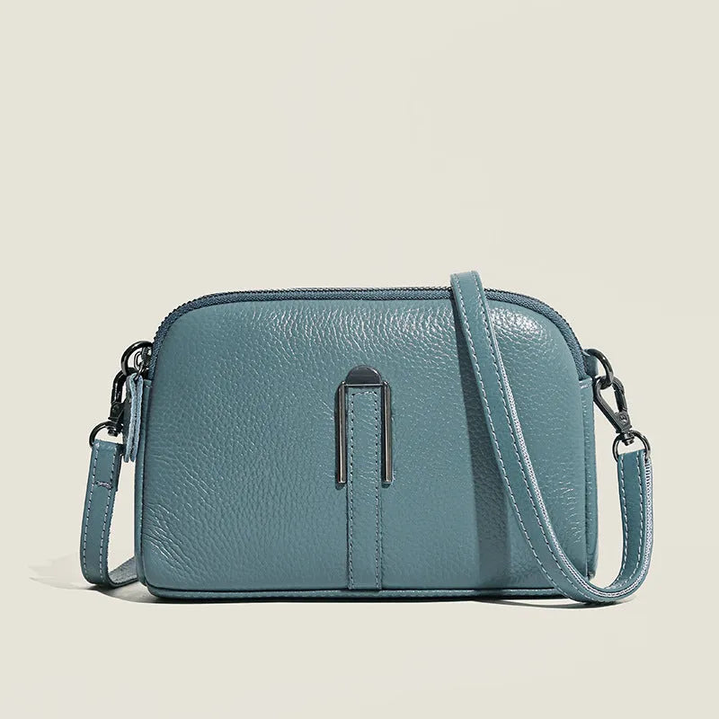 Women's genuine leather square shoulder bag in dark khaki colour, showing its structured shape and shoulder strap.