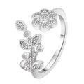 Women's copper floral open ring with diamond finish showing gold and white colour options