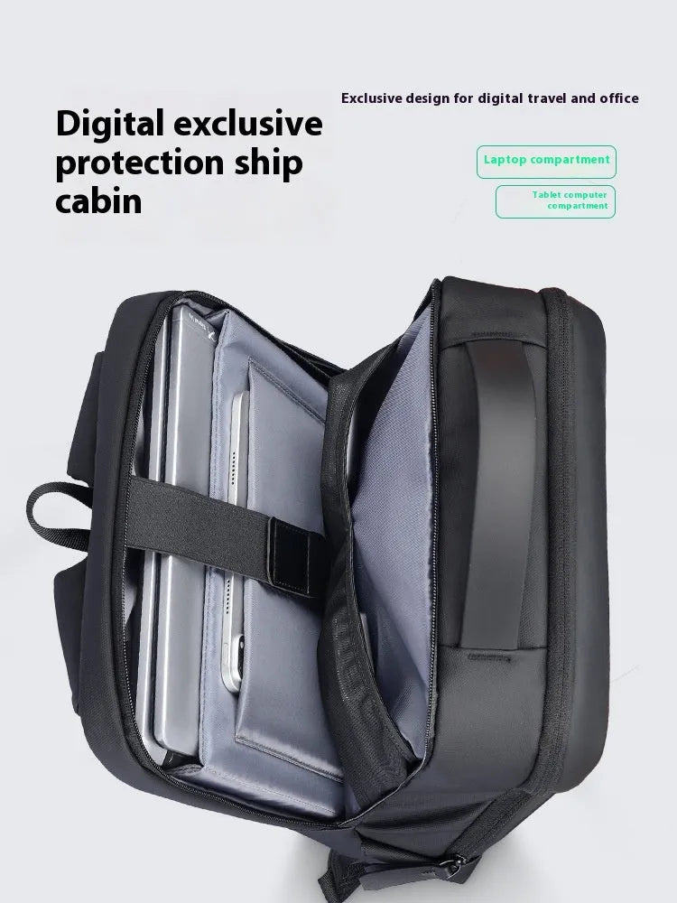 Graphite grey Oxford cloth business backpack with an external USB charging port on the strap.