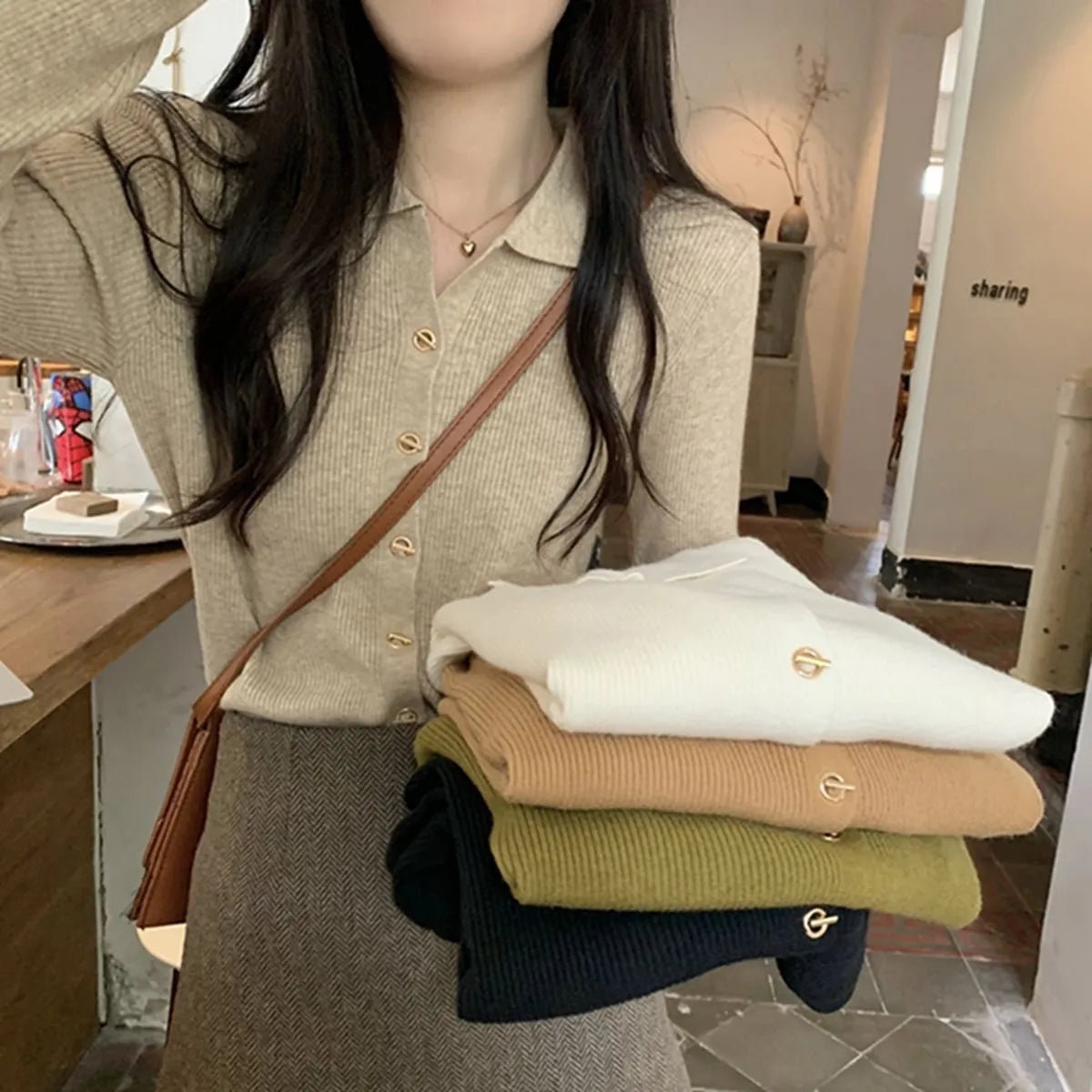 Long sleeved loose fit knitted cardigan top in viscose fibre, shown in beige colour.
