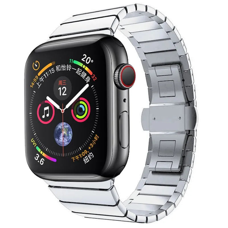 Silver metal Apple Watch band with butterfly clasp on a 40mm compatible watch case.