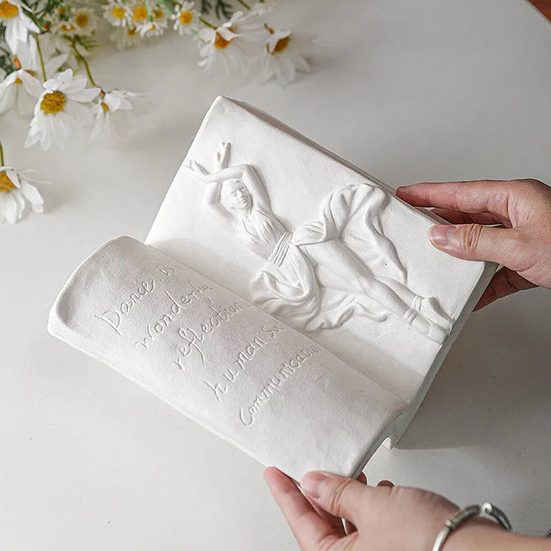 Ceramic book stand with glazed finish in decorative design for desktop storage