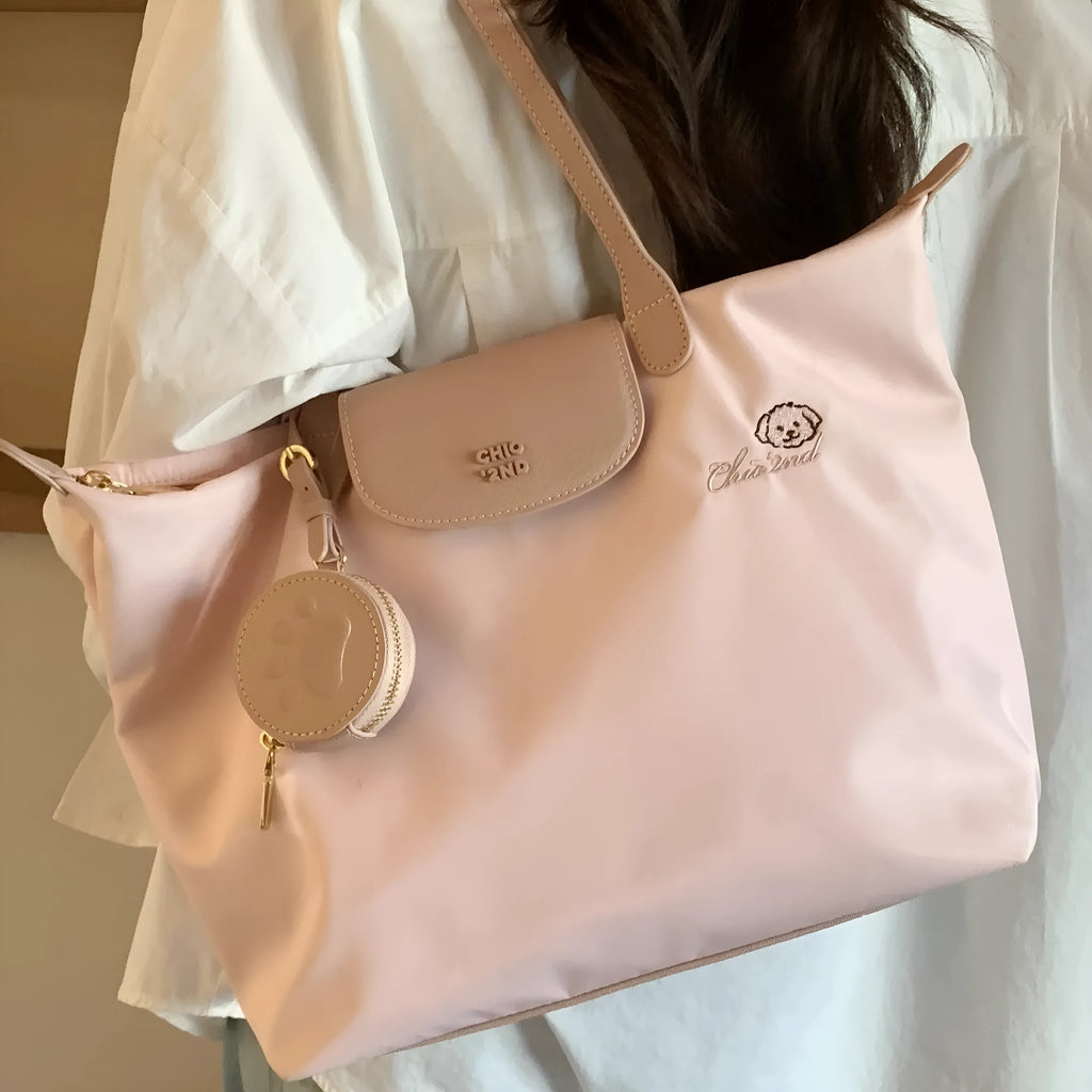 Oxford cloth tote bag with sandwich pockets showing pink colour option and mobile phone compartment