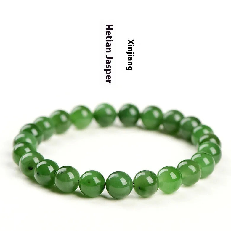 Natural jasper bead bracelet with polished spherical beads on a string, available in multiple sizes.