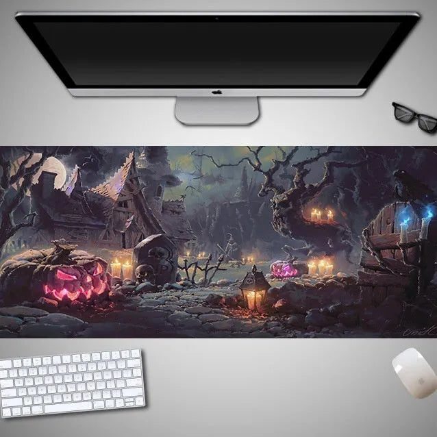 Oversized Halloween-themed computer mouse pad with non-slip rubber cloth base on a desk