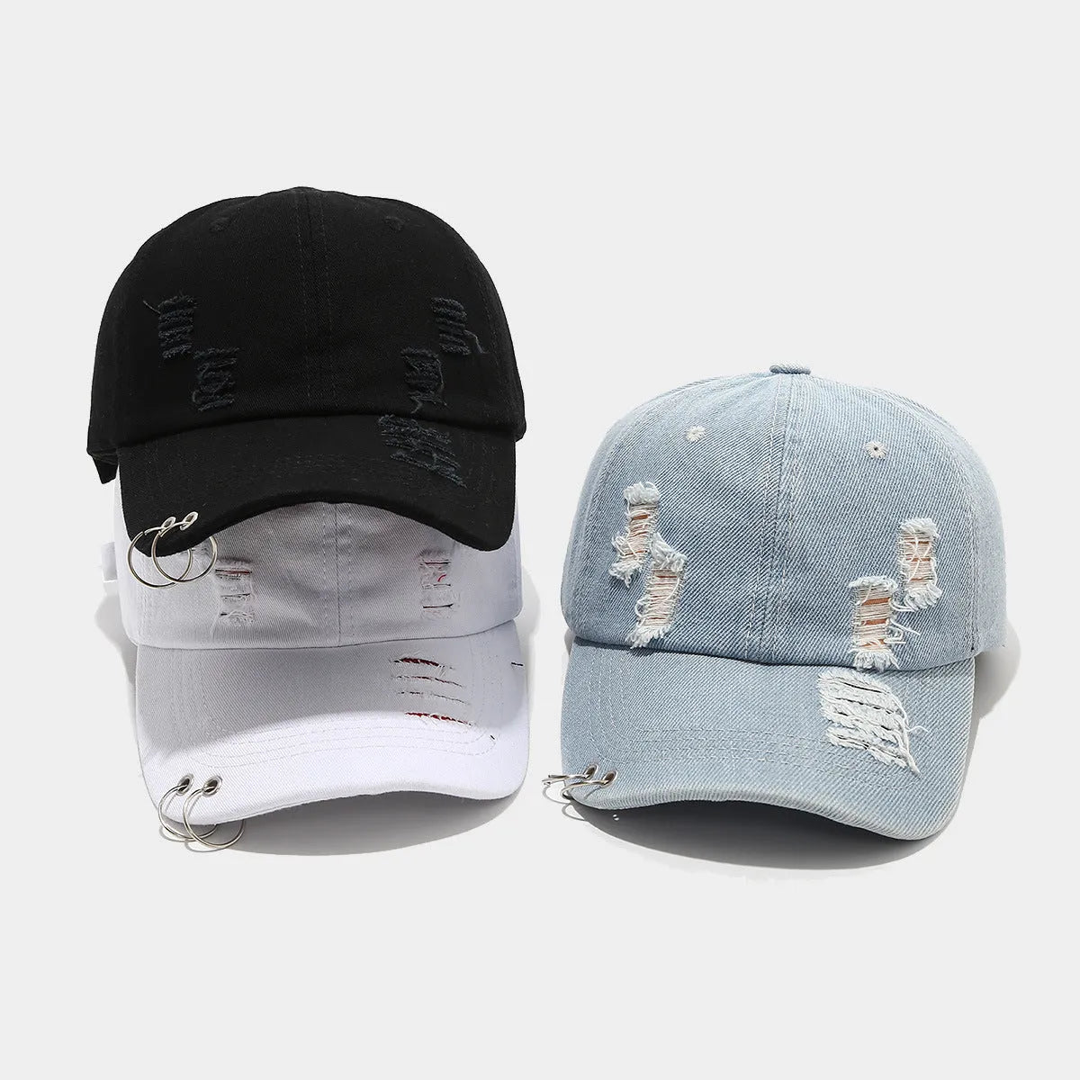 Men's adjustable denim peaked cap in black, white and light blue jeans colours with dome crown