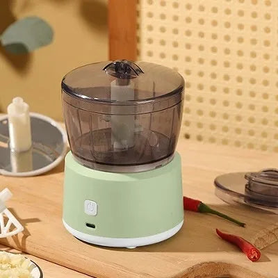 Mini electric meat grinder with transparent 225ml cup and stainless steel blades in light green or white