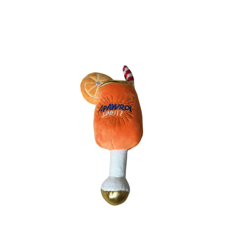 Yellow plush squeaky dog toy shaped like a beer bottle cup with textured surface
