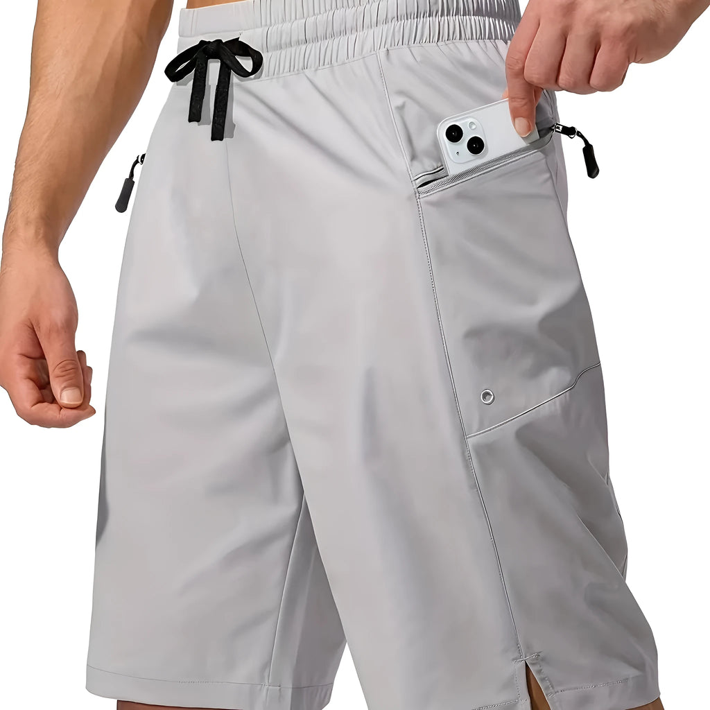 Men's solid colour quick-drying beach shorts in polyester fabric showing straight-leg cut