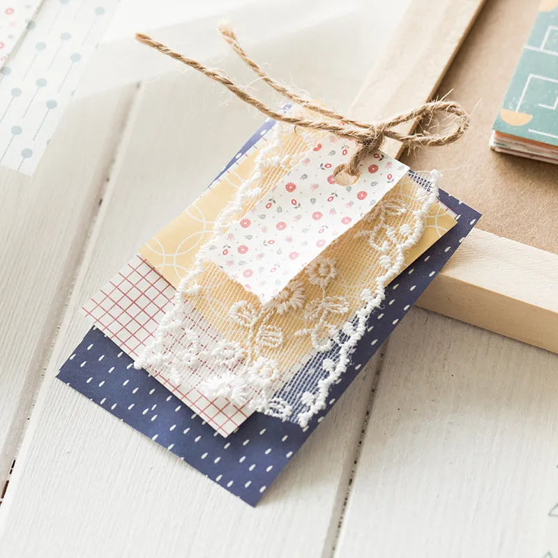 Retro collage note paper in ten pastel colours, each sheet 56mm by 83mm.