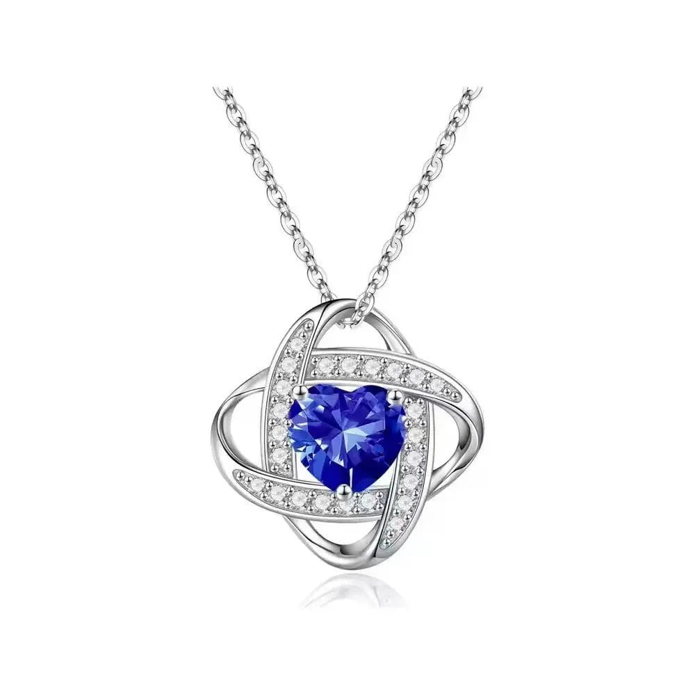 Close-up of a heart-shaped ladies necklace in electroplated copper, showing one of the platinum-toned colour options.