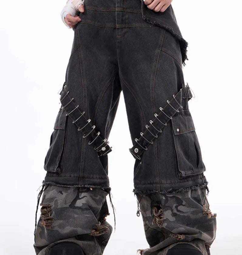 Men's grey and camouflage colour-block jeans with a structured pin and ribbon detail.