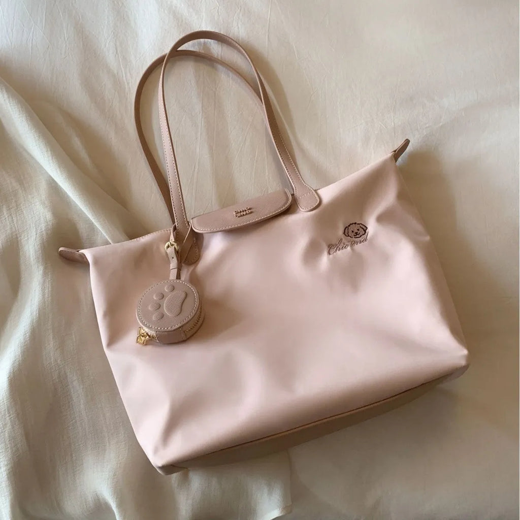 Oxford cloth tote bag with sandwich pockets showing pink colour option and mobile phone compartment
