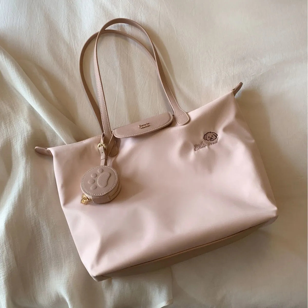 Oxford cloth tote bag with sandwich pockets showing pink colour option and mobile phone compartment