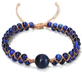 Handmade woven bracelet with geometric pattern in blue tigereye or amethyst stone beads