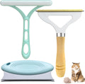 Three pet hair removal tools: metal lint brush, silicone roller, and round carpet scraper