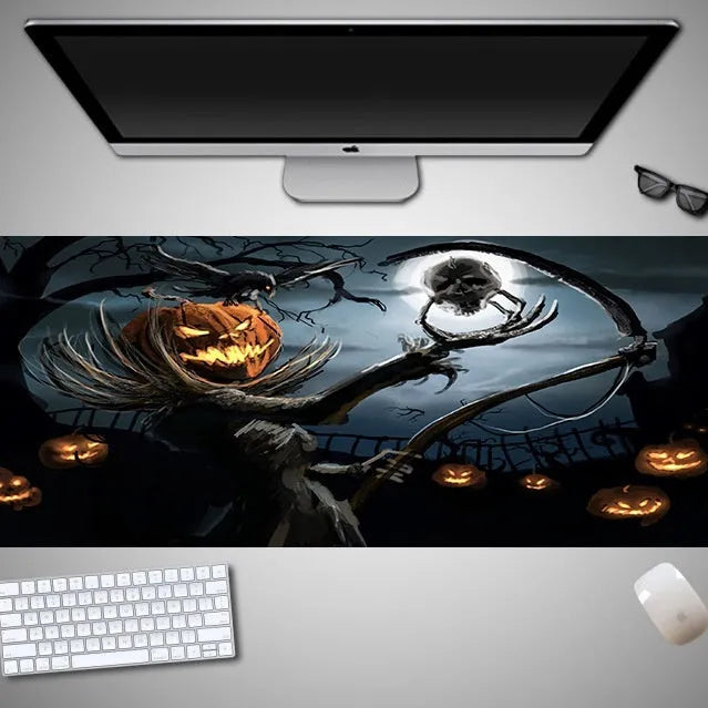 Oversized Halloween-themed computer mouse pad with non-slip rubber cloth base on a desk