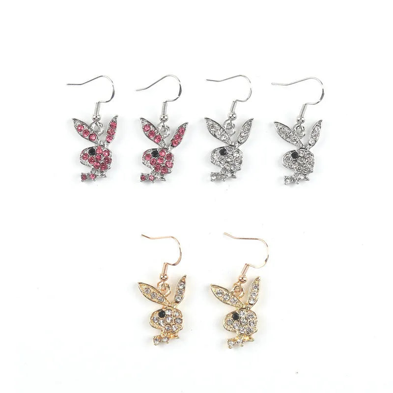 Rabbit stud earrings with diamond-cut surface detail in gold, pink and silver metallic finishes