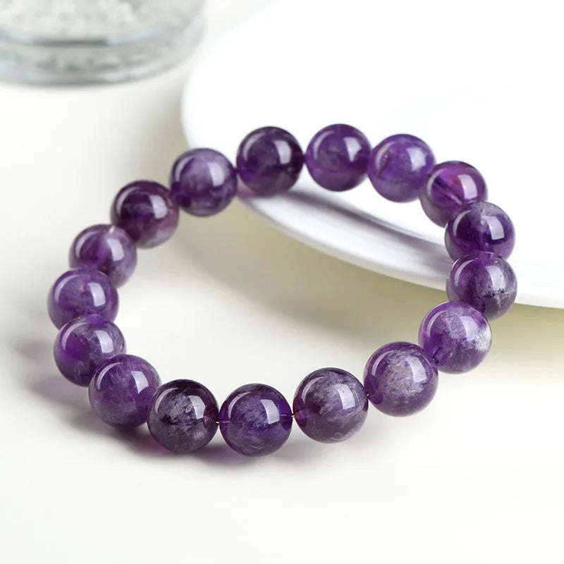 Natural feather amethyst bracelet with purple scattered beads and geometric Ruyi design