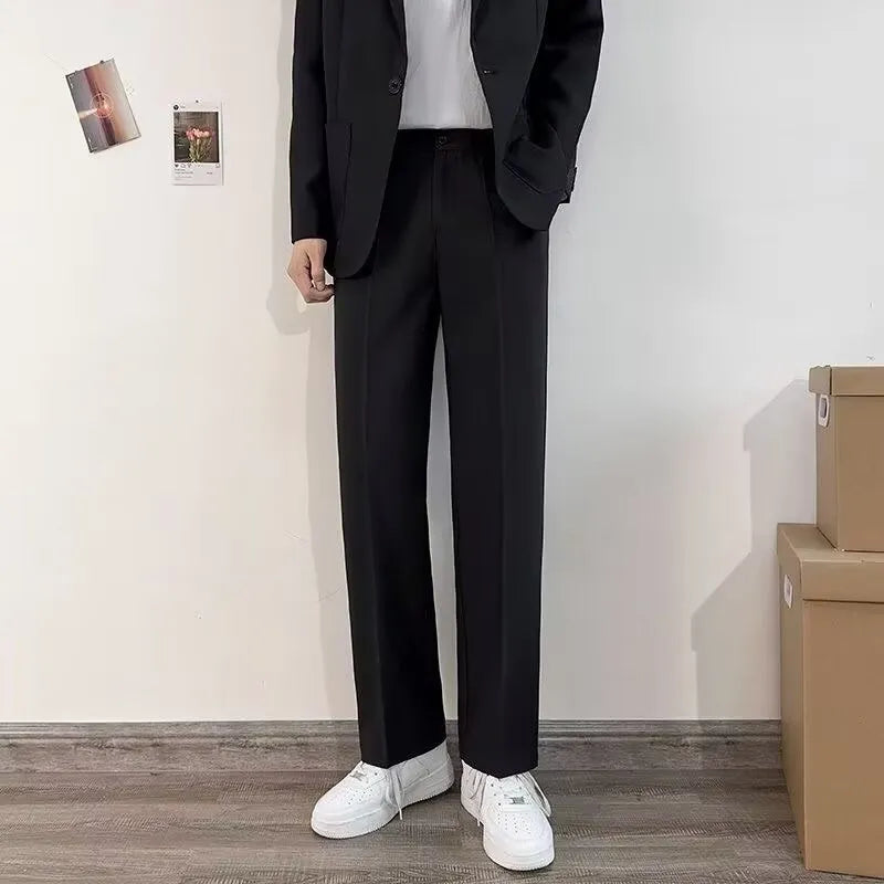 Plus size men's college style suit set with trousers, white shirt, and tie included