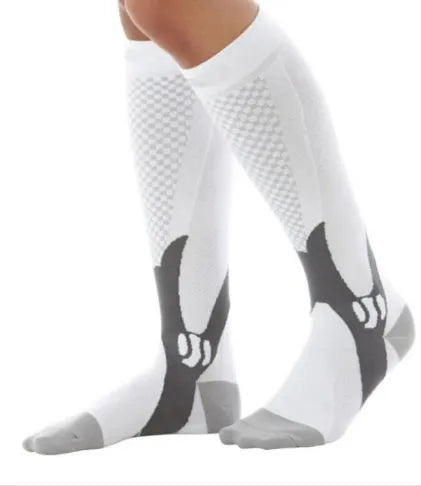 Black graduated compression socks with athletic fit for men and women, shown laid flat.