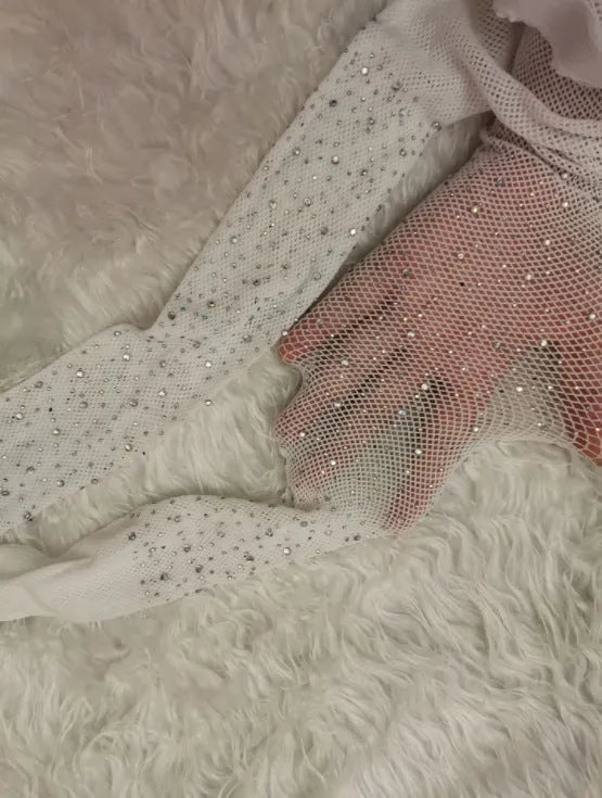 Women's fishnet stockings with diamond mesh pattern in skin colour, black, or white options