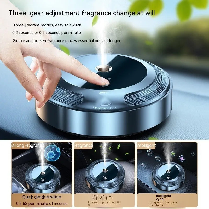 Car air freshener with vehicle logo design and USB charging cable on a car dashboard.