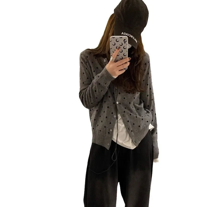 Women's grey dot knit viscose cardigan with crocheted flower details and long sleeves